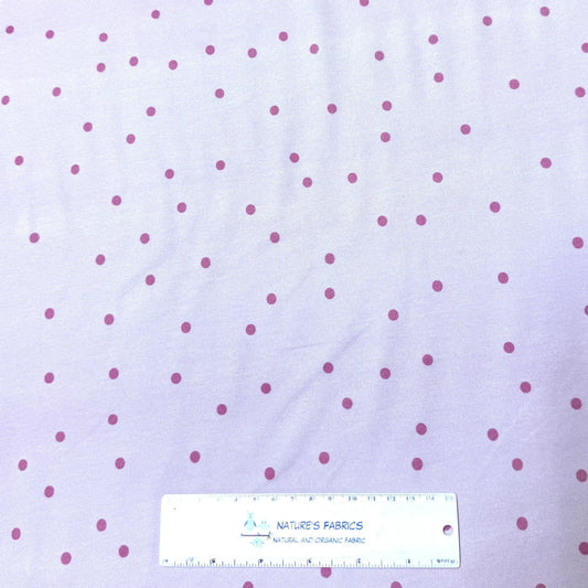 Light purple fabric with pink polka dots by Nature's Fabrics.