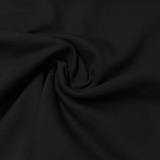 Black organic cotton fabric by Nature's Fabrics, soft and eco-friendly textile for crafting