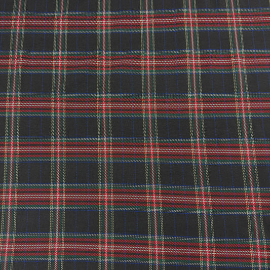 Nature's Fabrics black plaid fabric with red, green, and blue tartan pattern, ideal for sewing projects.