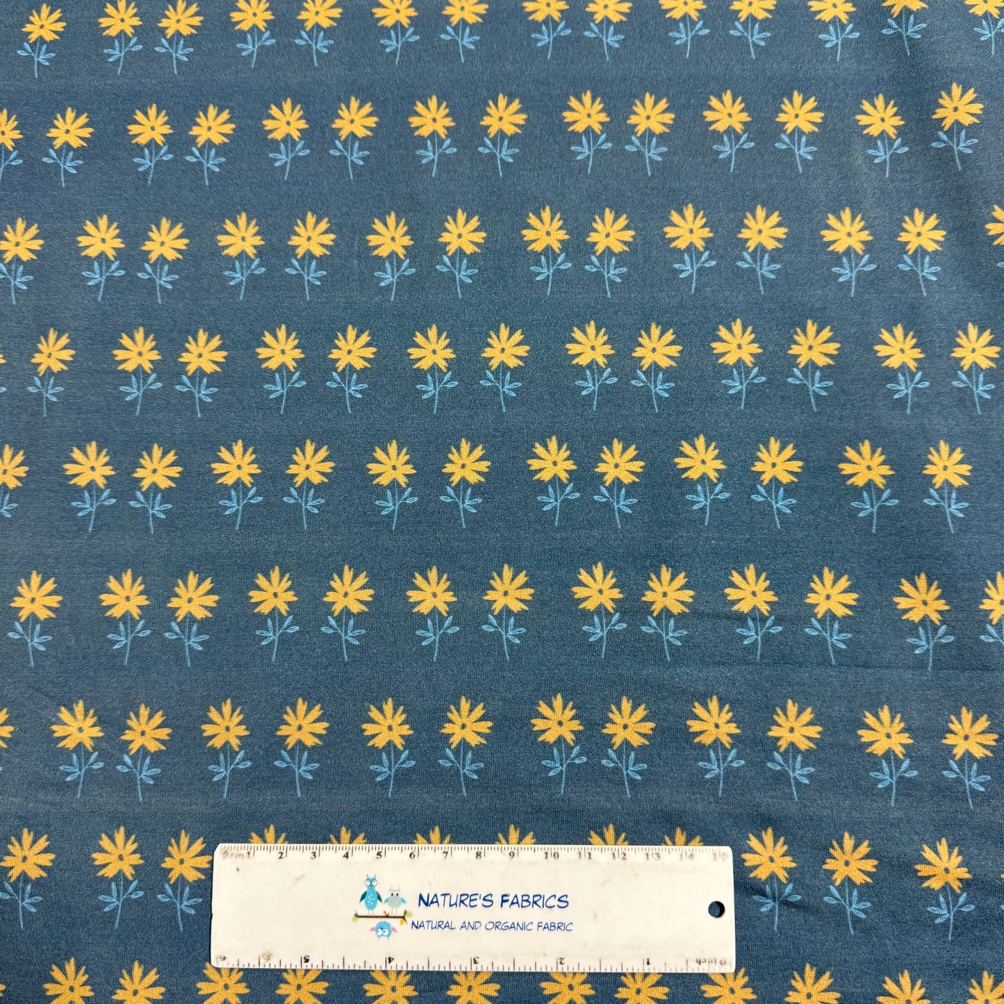 Tan Flowers on Blue Bamboo/Spandex Jersey Fabric - Printed in the USA