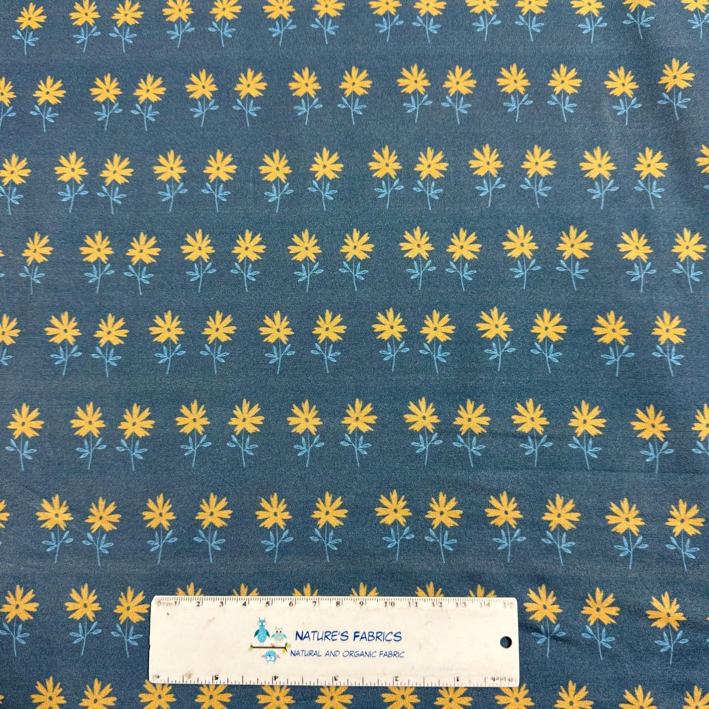 Tan Flowers on Blue Bamboo/Spandex Jersey Fabric - Printed in the USA