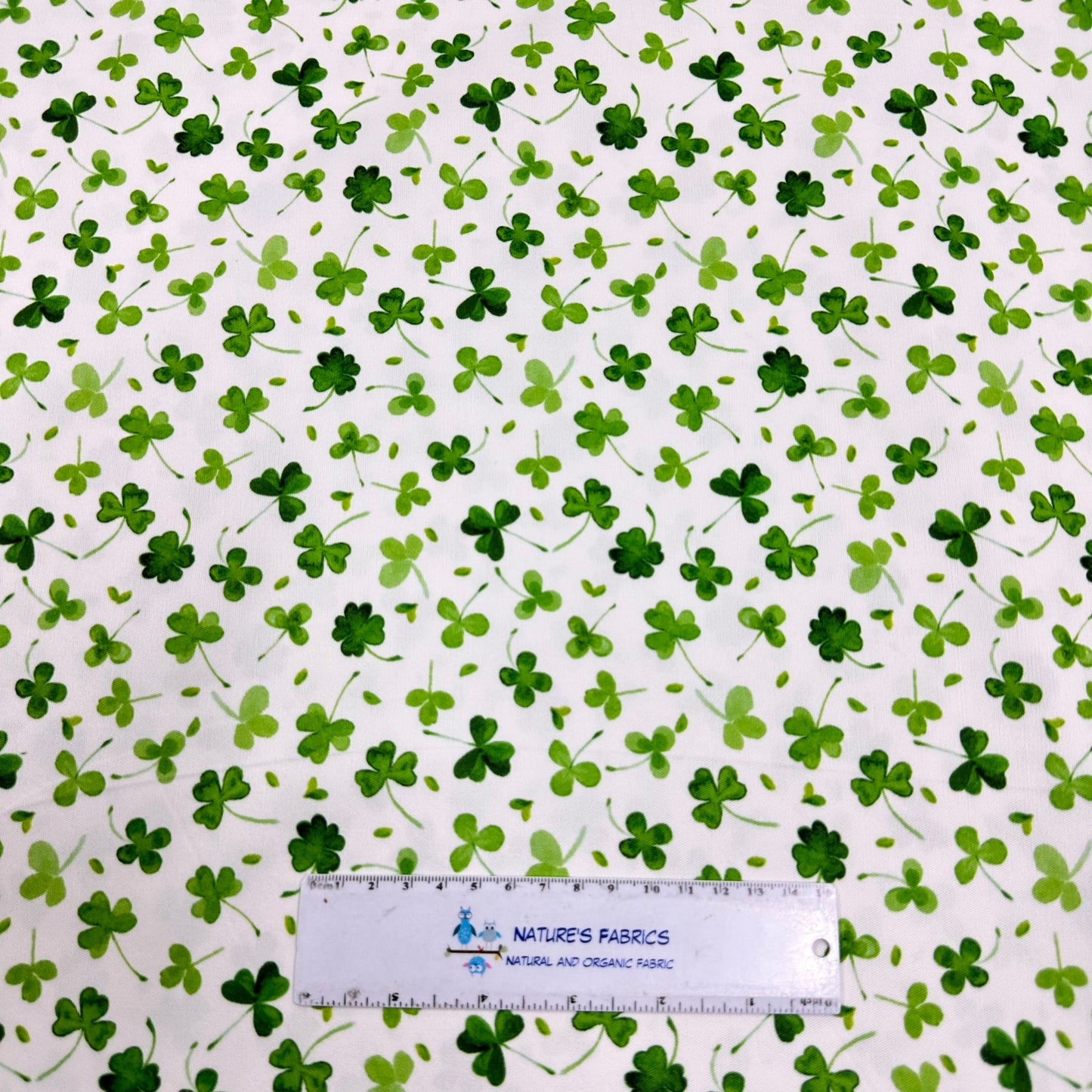 Shamrocks on White 1 mil PUL Fabric- Made in the USA