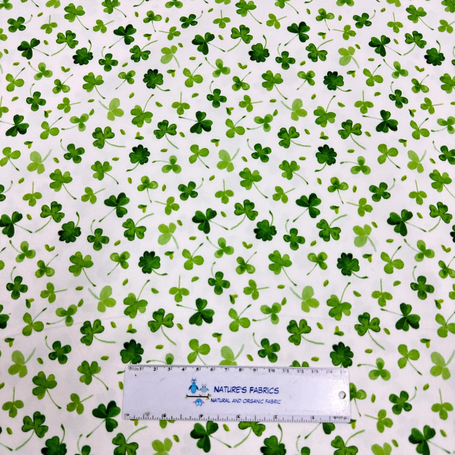 Shamrocks on White 1 mil PUL Fabric- Made in the USA