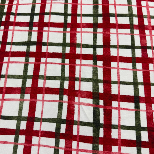 Red, green, and white plaid fabric by Nature's Fabrics — festive pattern for holiday sewing projects
