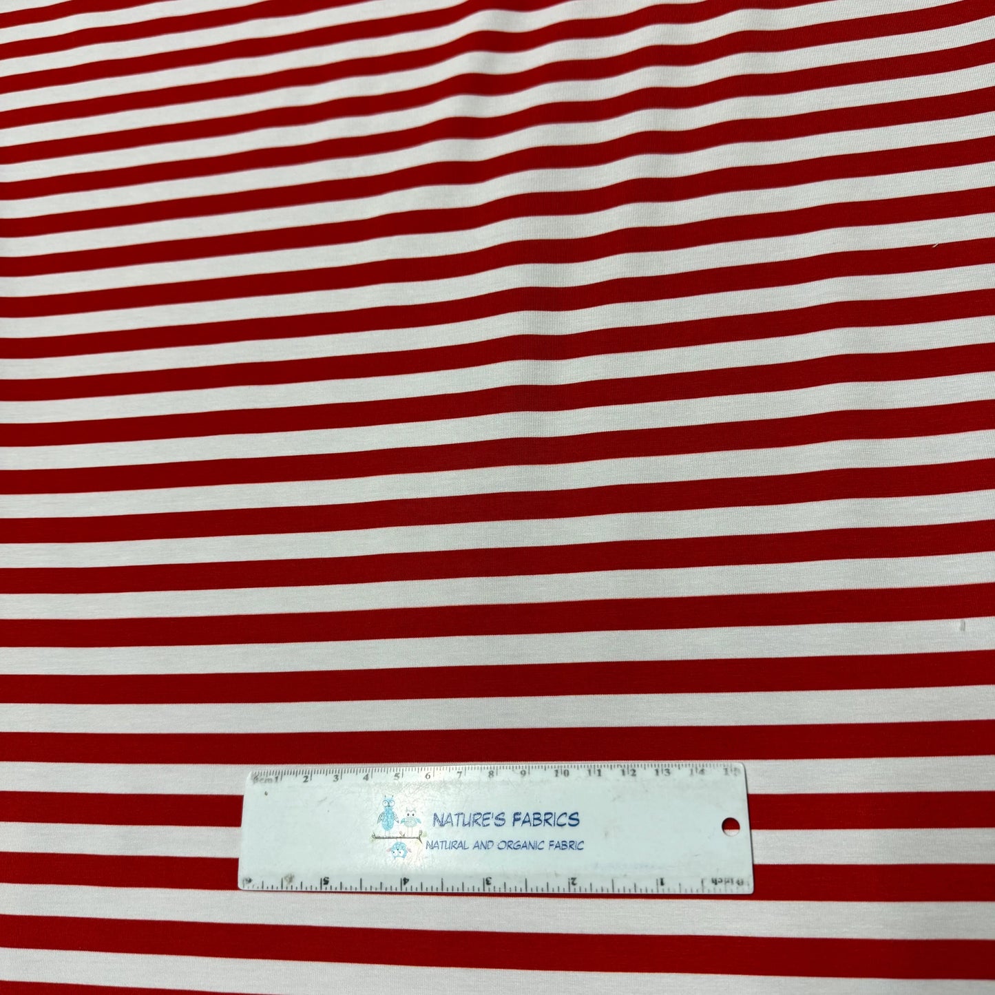 Red and white striped organic cotton fabric by Nature's Fabrics, natural and eco-friendly textile