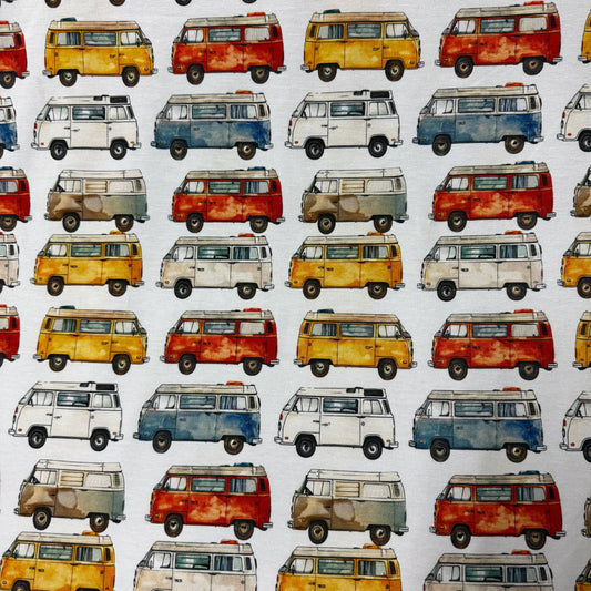Nature's Fabrics organic cotton fabric featuring a colorful watercolor vintage camper van pattern.