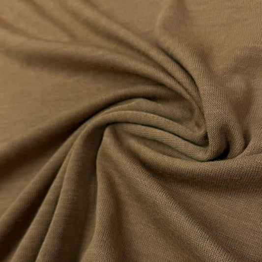 Soft brown organic cotton fabric swirled for texture — Nature's Fabrics