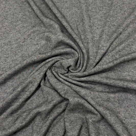 Close-up of swirled grey natural fabric from Nature's Fabrics