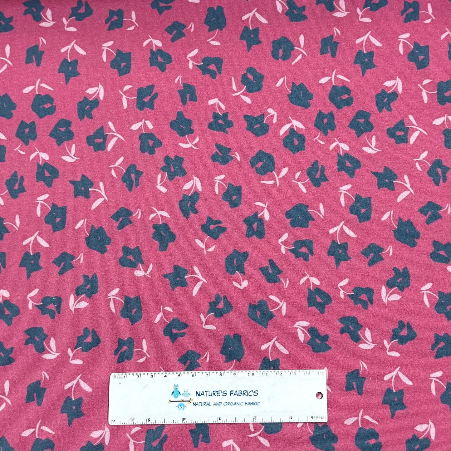 Blue Flowers on Rose Bamboo/Spandex Jersey Fabric - Printed in the USA