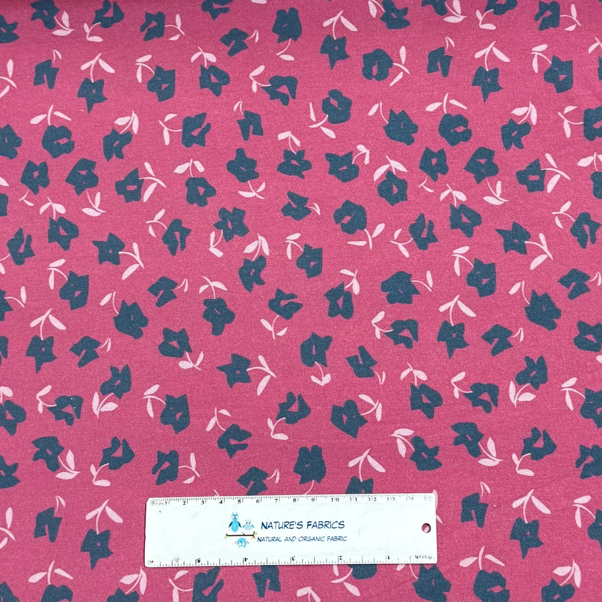 Pink floral fabric with navy and white blooms by Nature's Fabrics, organic cotton yardage