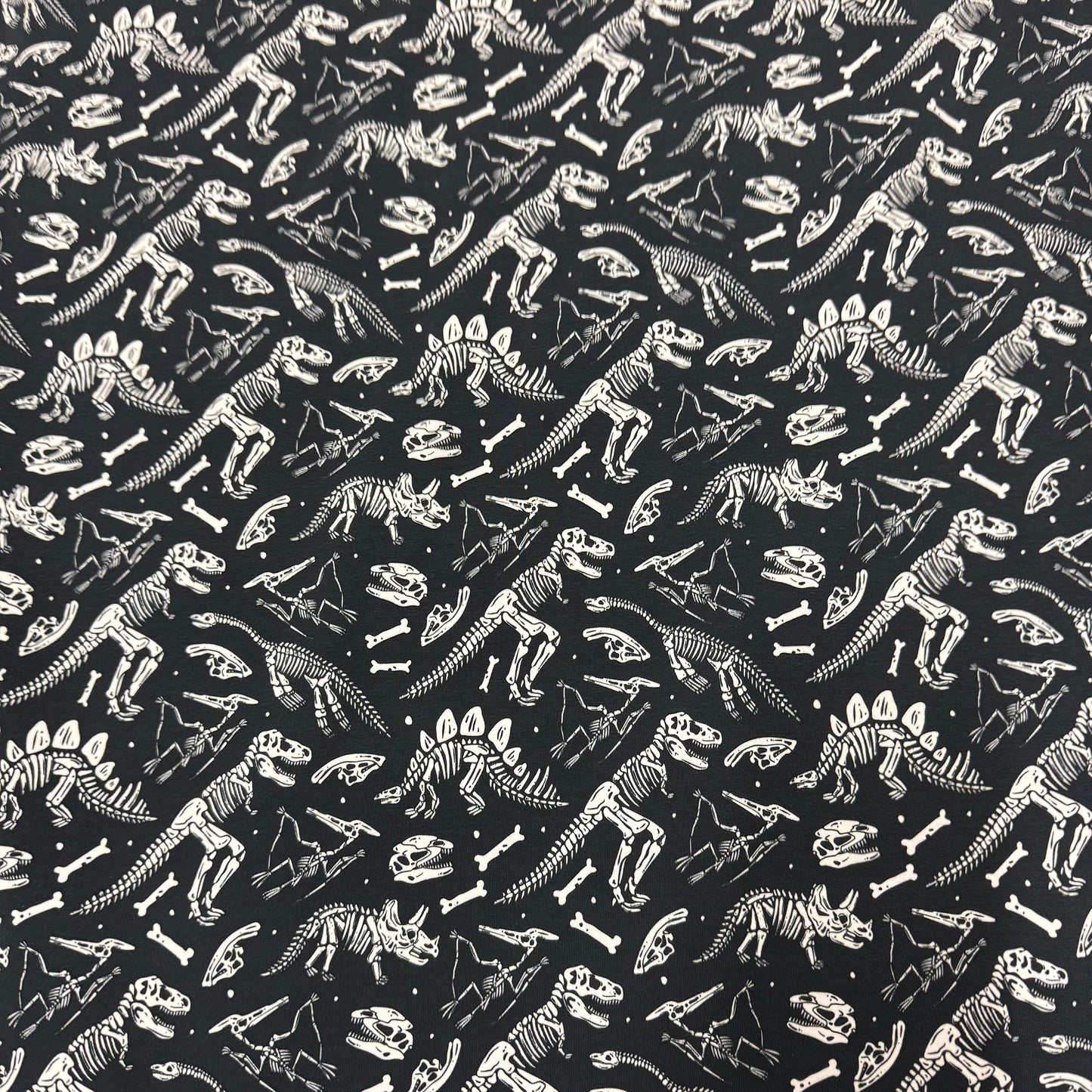 Dino Skeletons on Organic Cotton/Spandex Jersey Fabric