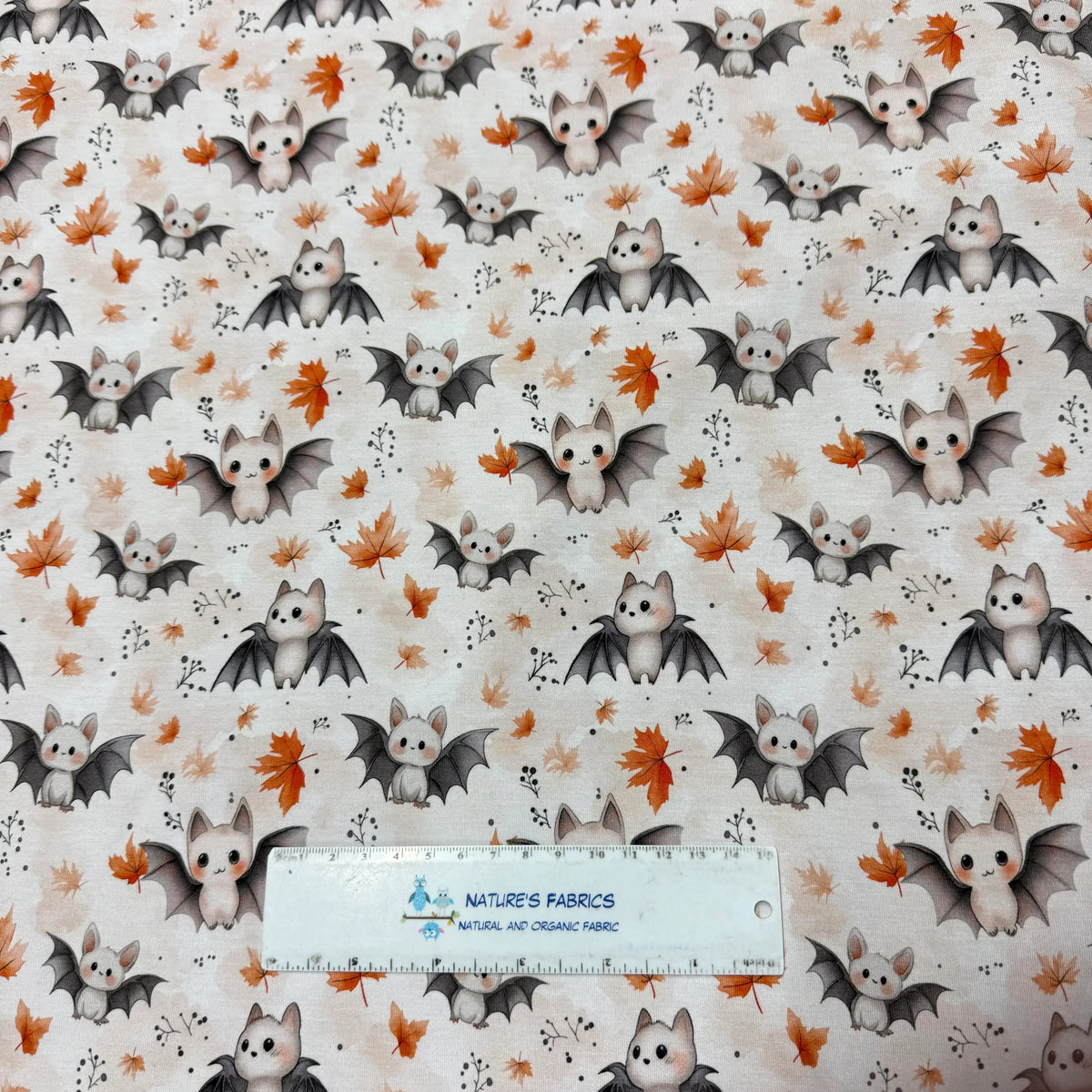 Cute bat and autumn leaf pattern fabric by Nature's Fabrics, organic cotton material
