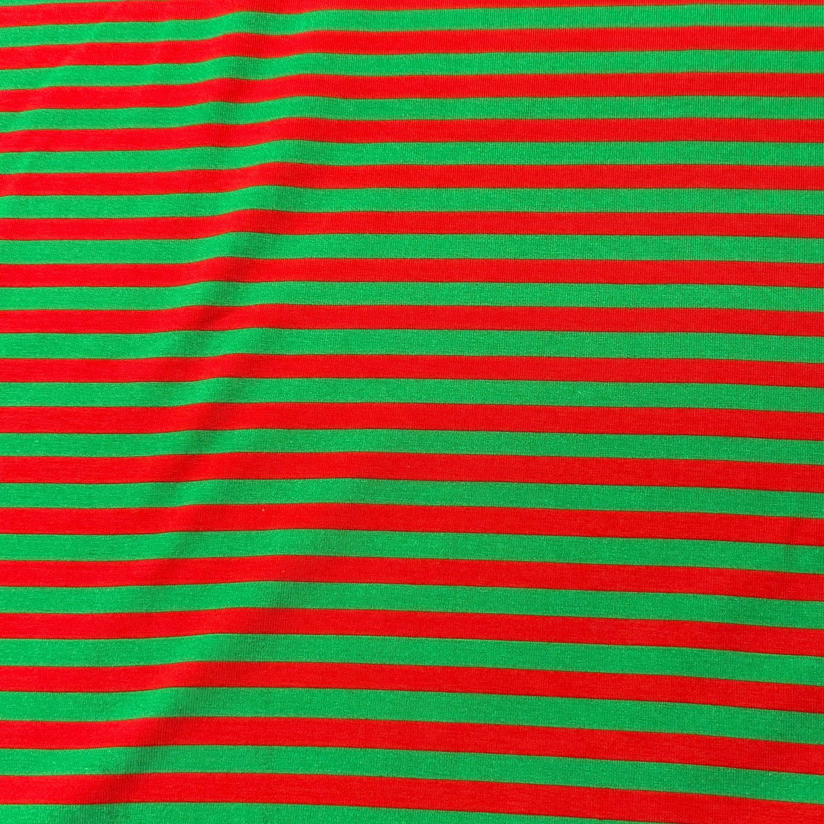 Red and green horizontal striped fabric from Nature's Fabrics