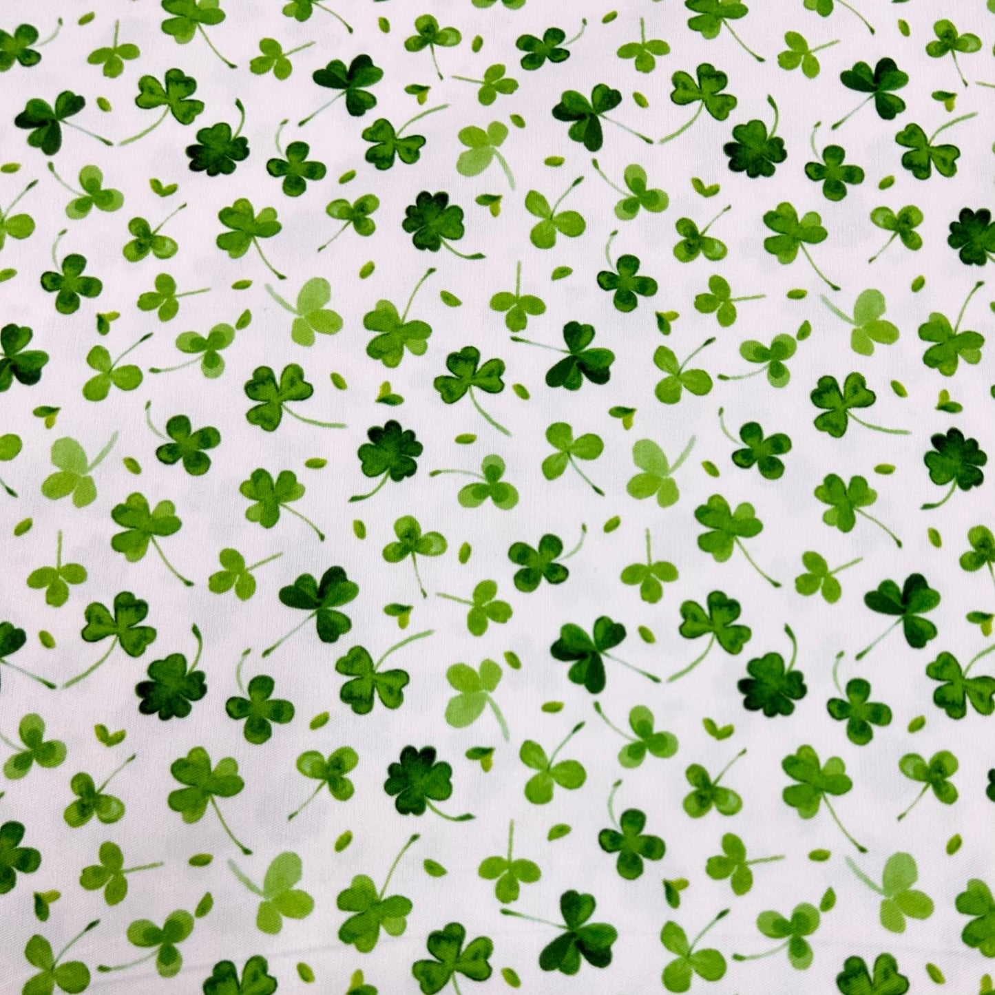 Shamrocks on White 1 mil PUL Fabric- Made in the USA