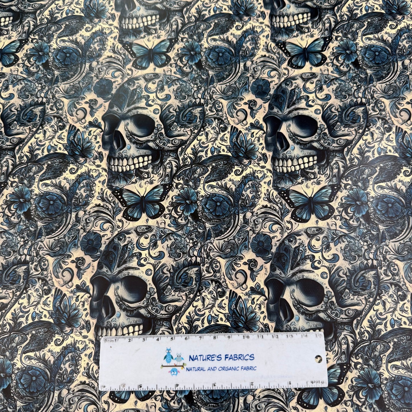 Blue Floral Skulls on Smooth Vinyl Fabric
