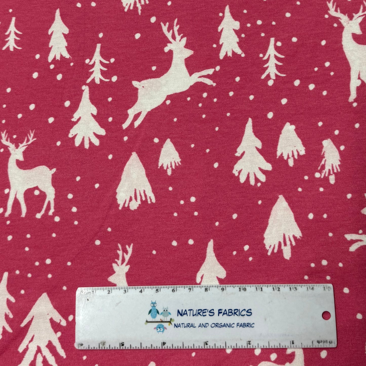 Off White Reindeer on Pink Bamboo/Spandex Jersey Fabric - Printed in the USA