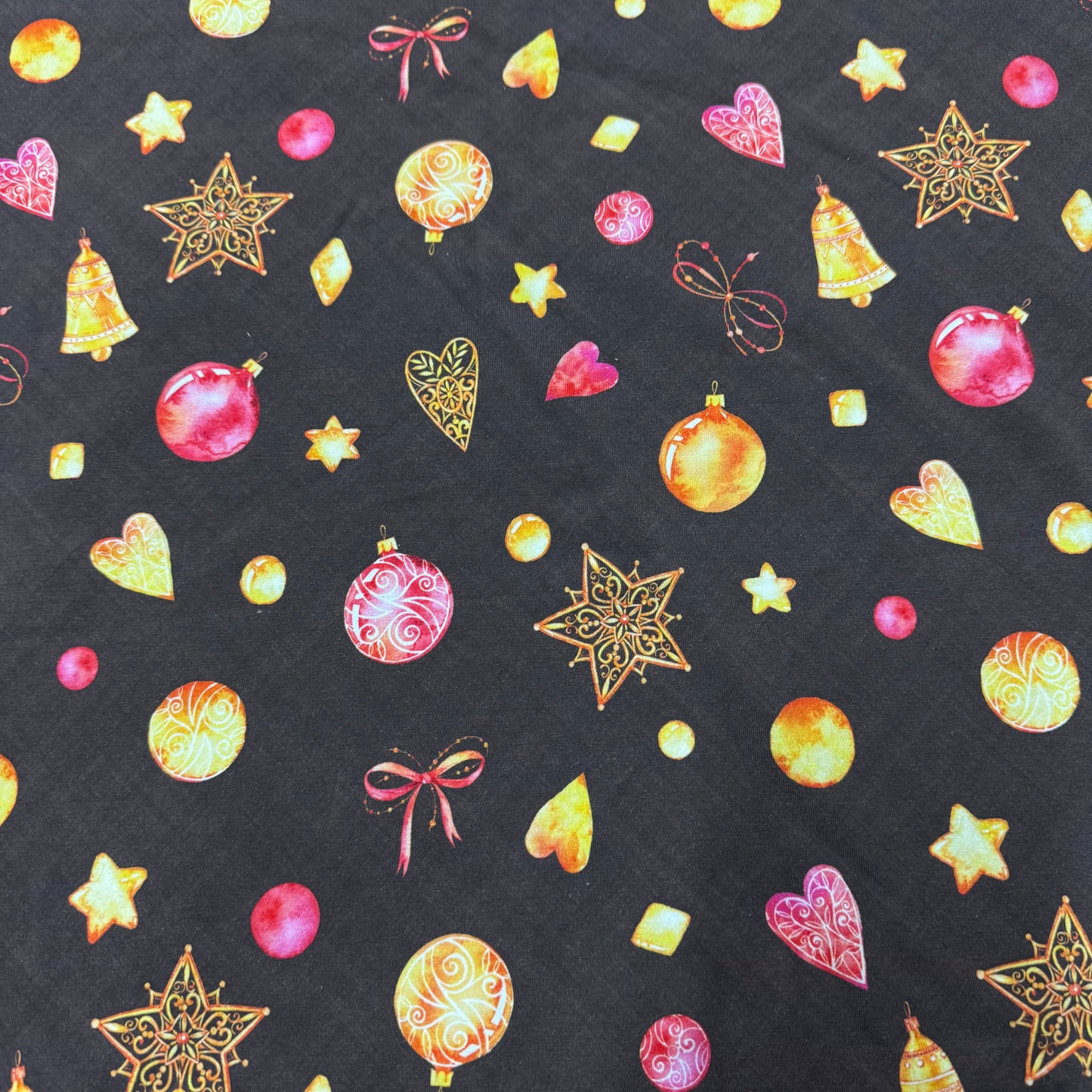 Ornaments on Brown Cotton/Spandex Jersey Fabric