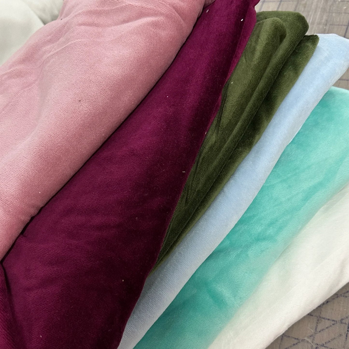 Nature's Fabrics soft velvet fabric by the yard in pink, burgundy, olive, mint, and white