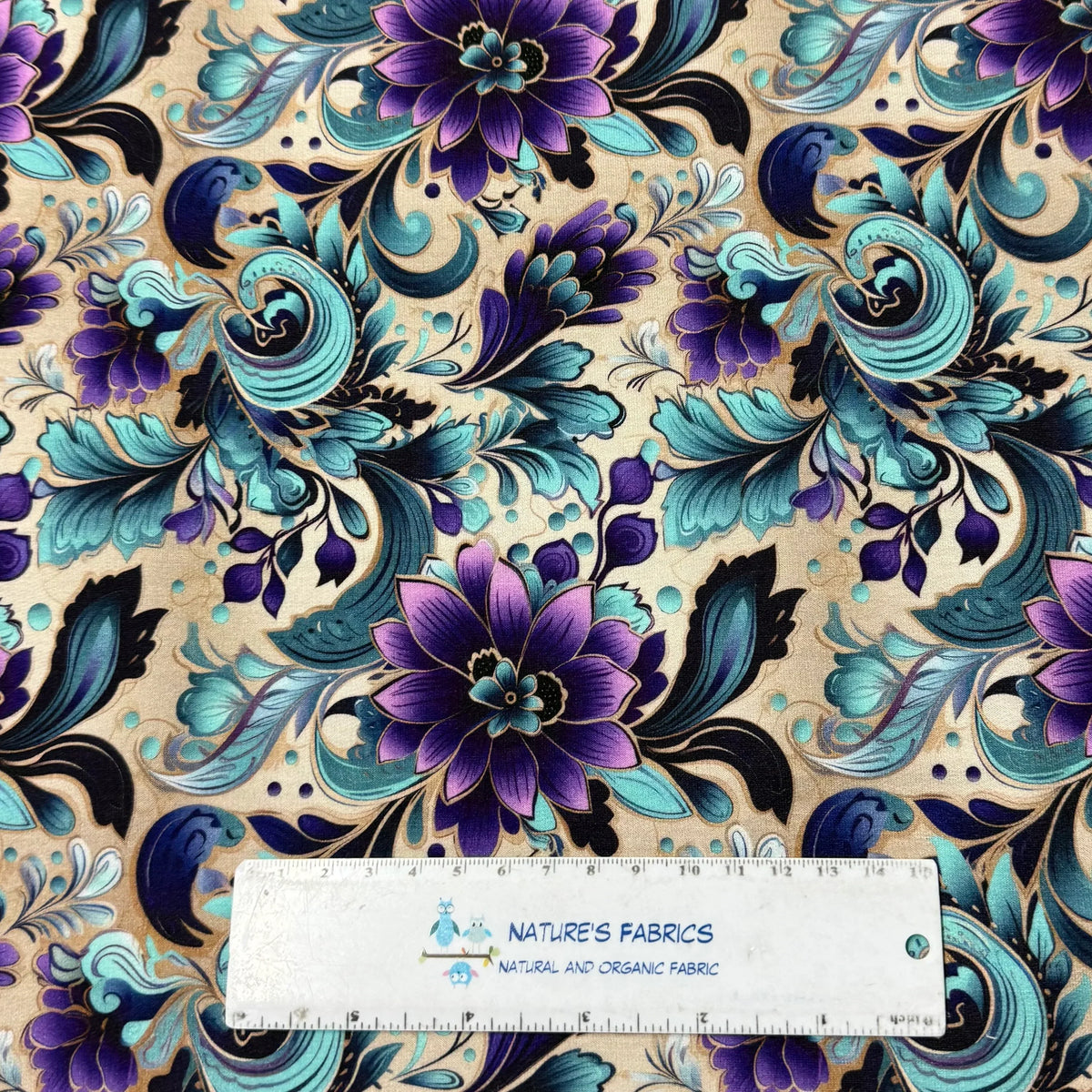 Nature's Fabrics purple and teal floral pattern organic cotton fabric with ruler for scale