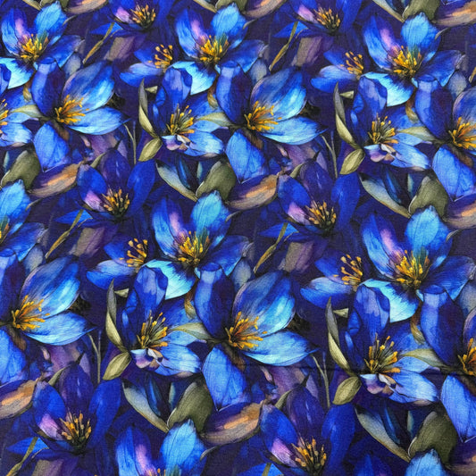 Nature's Fabrics blue floral print fabric with detailed botanical blossoms