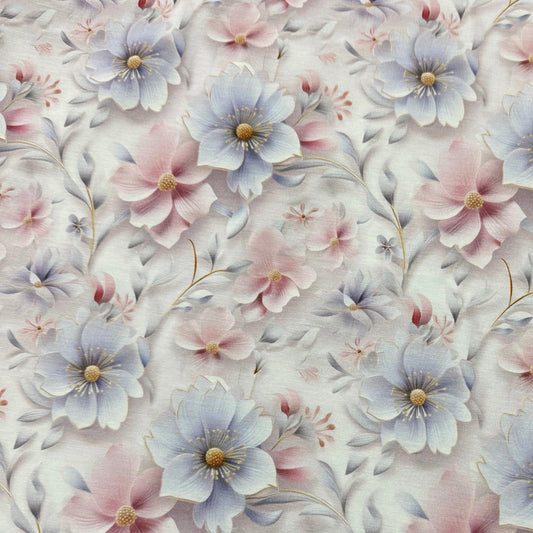 Nature's Fabrics premium fabric featuring a soft blue and pink floral pattern.