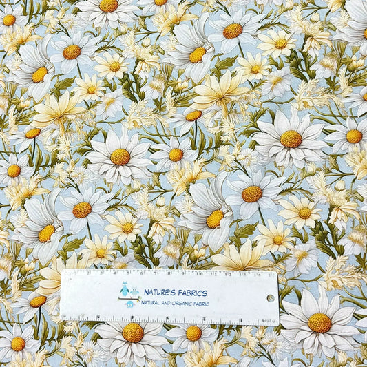 Nature's Fabrics organic cotton fabric with a white and yellow daisy floral print