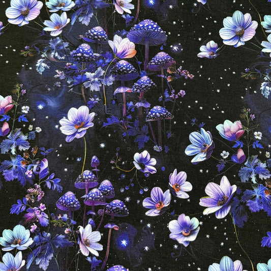 Nature's Fabrics purple and blue floral and mushroom pattern fabric on a dark starry background