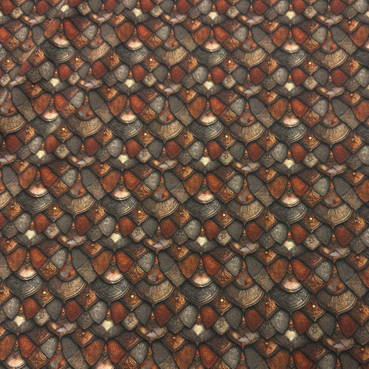 Dragon scale pattern fabric by Nature's Fabrics, featuring metallic bronze and gray scales for fantasy costume or decor.