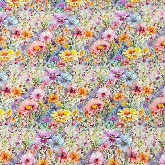 Watercolor floral print fabric from Nature's Fabrics featuring colorful wildflowers.