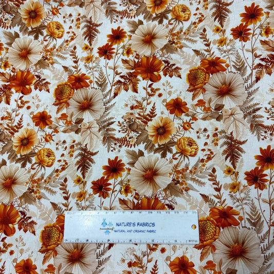 Nature's Fabrics organic cotton fabric with vintage orange and brown floral pattern.