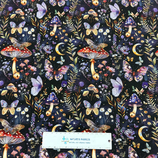 Nature's Fabrics: magical mushroom & butterfly print on dark fabric with crescent moons, wildflowers, and stars