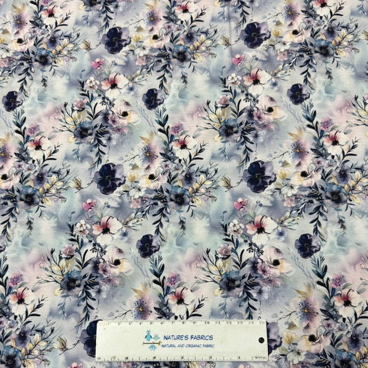 Nature's Fabrics blue and purple floral print organic fabric with measuring ruler