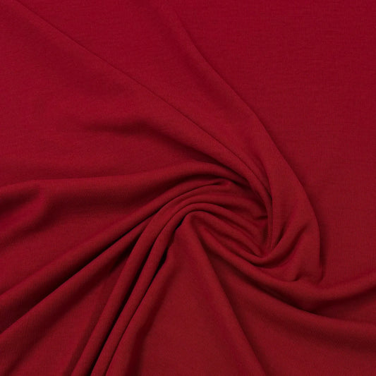 Rich red organic cotton fabric swirled for texture — Nature's Fabrics