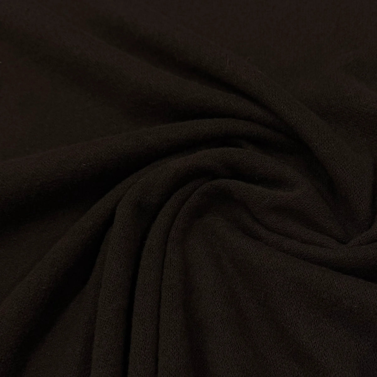 Dark brown organic cotton fabric by Nature's Fabrics, soft texture for sewing projects