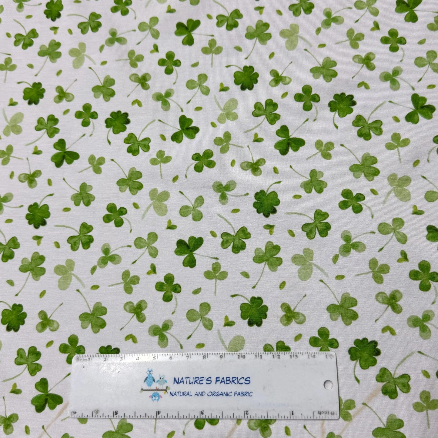 Green shamrock print organic cotton fabric by Nature's Fabrics, natural and eco-friendly textile for crafting