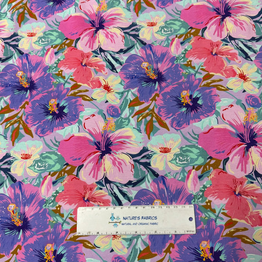 Nature's Fabrics organic cotton fabric with a colorful pink and purple hibiscus floral print