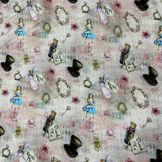 Nature's Fabrics Alice in Wonderland themed pattern fabric with teacups, hats, and characters.