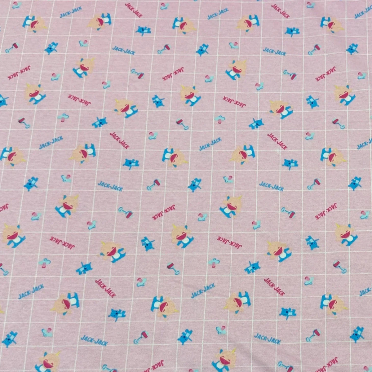 Pink Nature's Fabrics cotton material with Jack-Jack baby character print.
