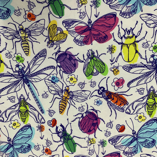 Colorful illustrated insect pattern on Nature's Fabrics premium natural fabric.