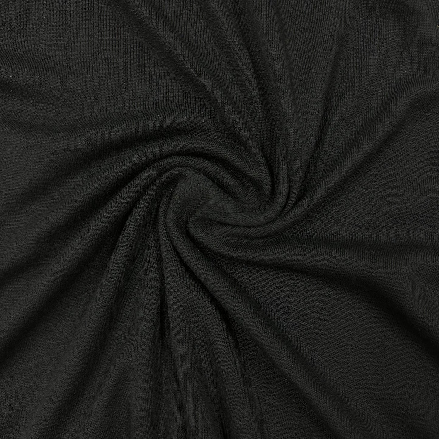 Black 100% Merino Wool Pointelle Jersey Fabric 150gsm - Nature's Fabrics