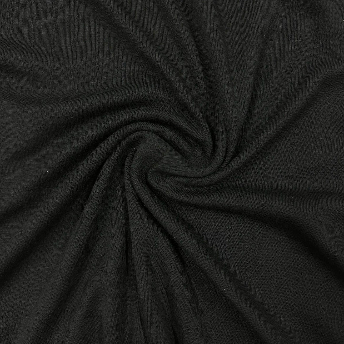 Black 100% Merino Wool Pointelle Jersey Fabric 150gsm - Nature's Fabrics