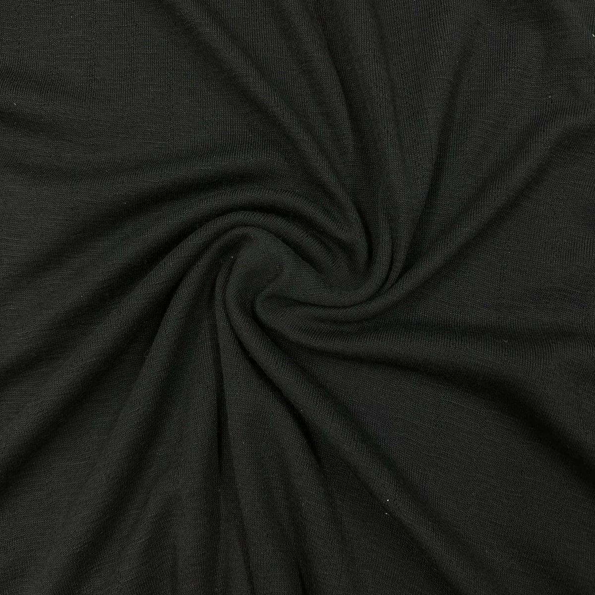Black 100% Merino Wool Pointelle Jersey Fabric 150gsm - Nature's Fabrics