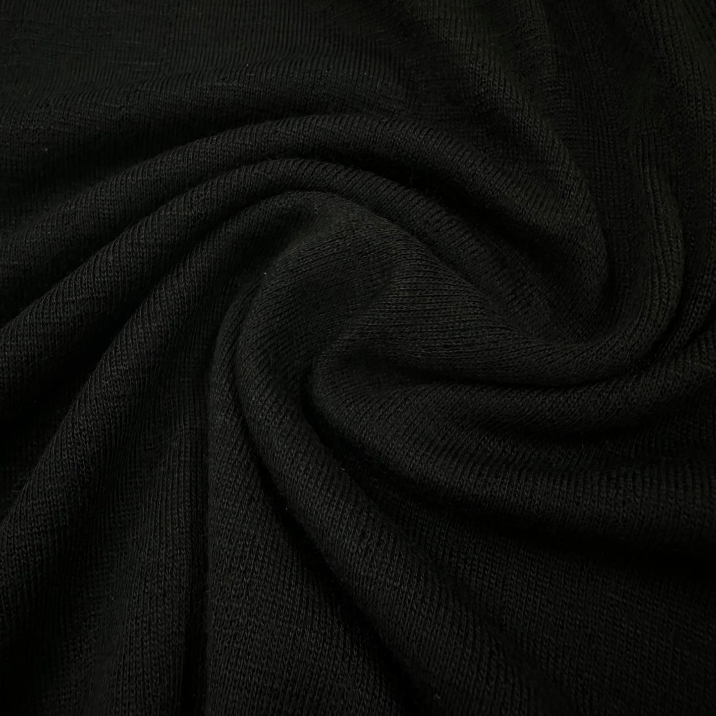 Black 100% Merino Wool Pointelle Jersey Fabric 150gsm - Nature's Fabrics