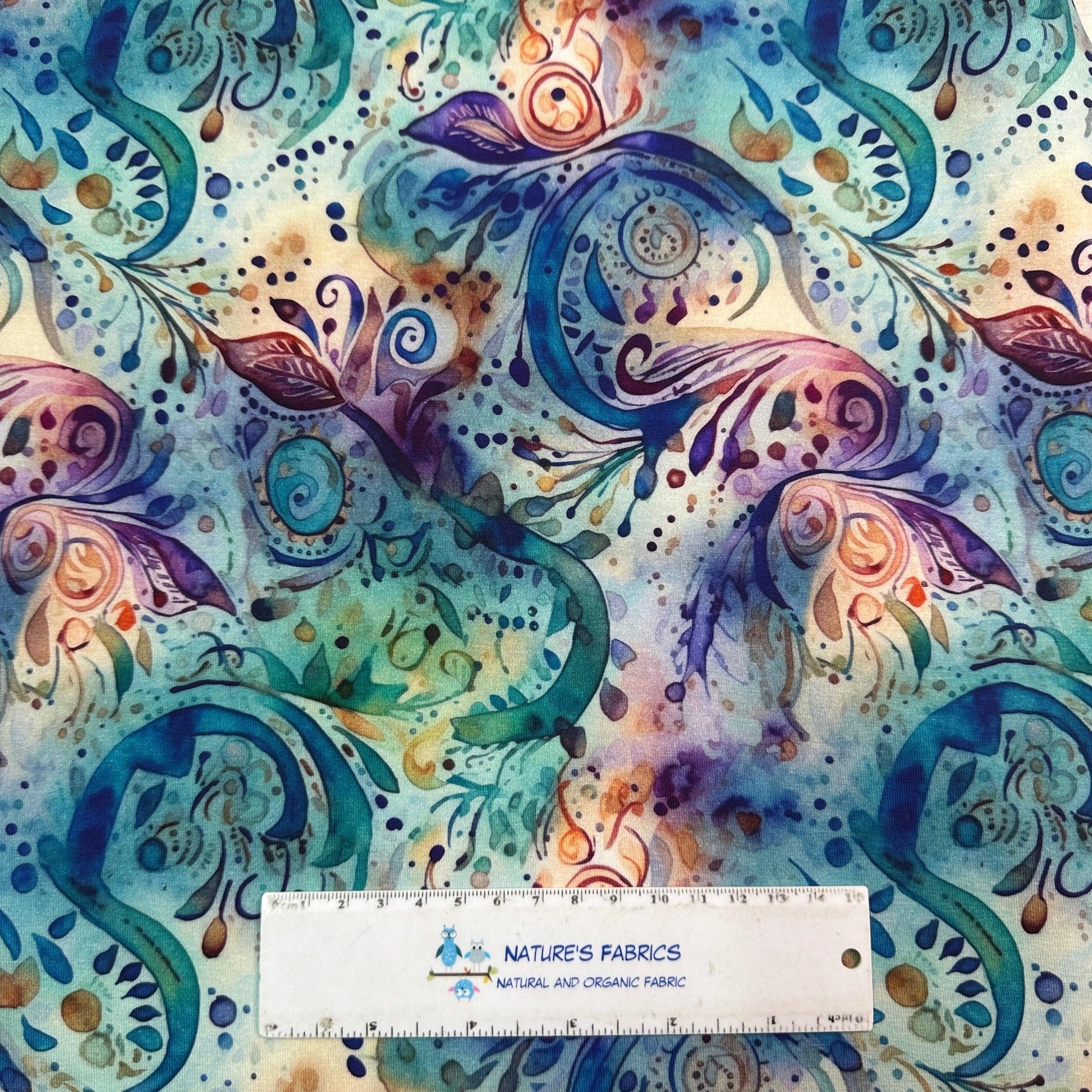 Blue and Purple Paisley on Organic Cotton/Spandex Jersey Fabric - Nature's Fabrics