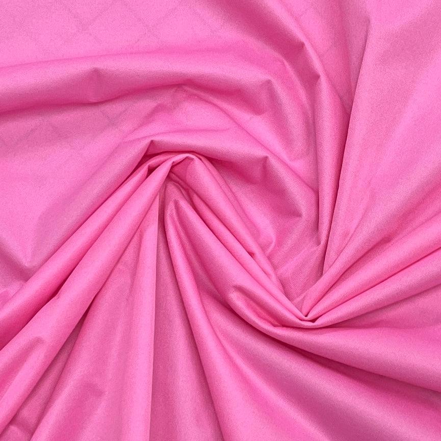 Draped bright pink natural fabric from Nature's Fabrics.