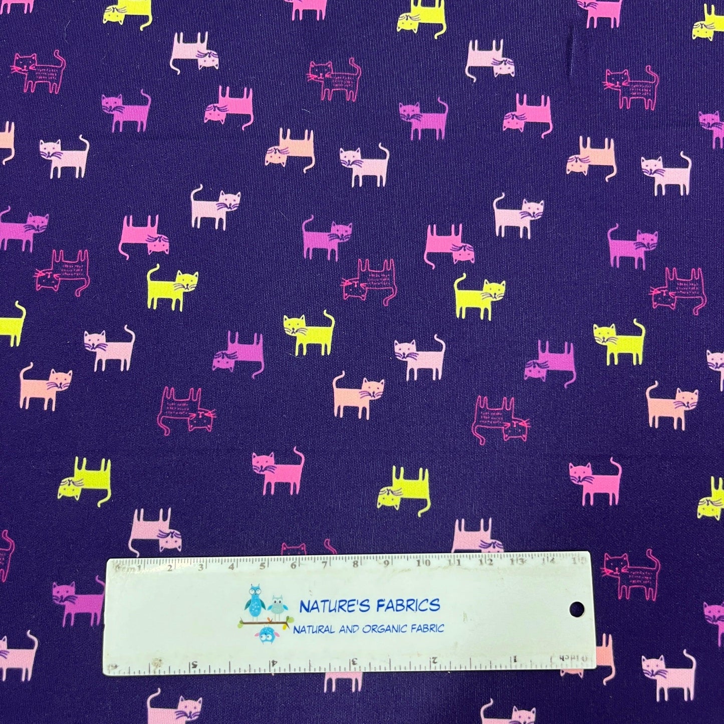 Cats on Purple Athletic Jersey Fabric - Nature's Fabrics