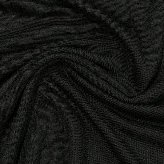 Close-up of draped black natural fabric from Nature's Fabrics