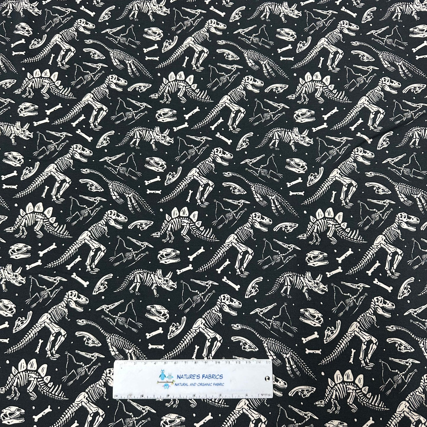 Dino Skeletons on Bamboo/Spandex Jersey Fabric - Nature's Fabrics