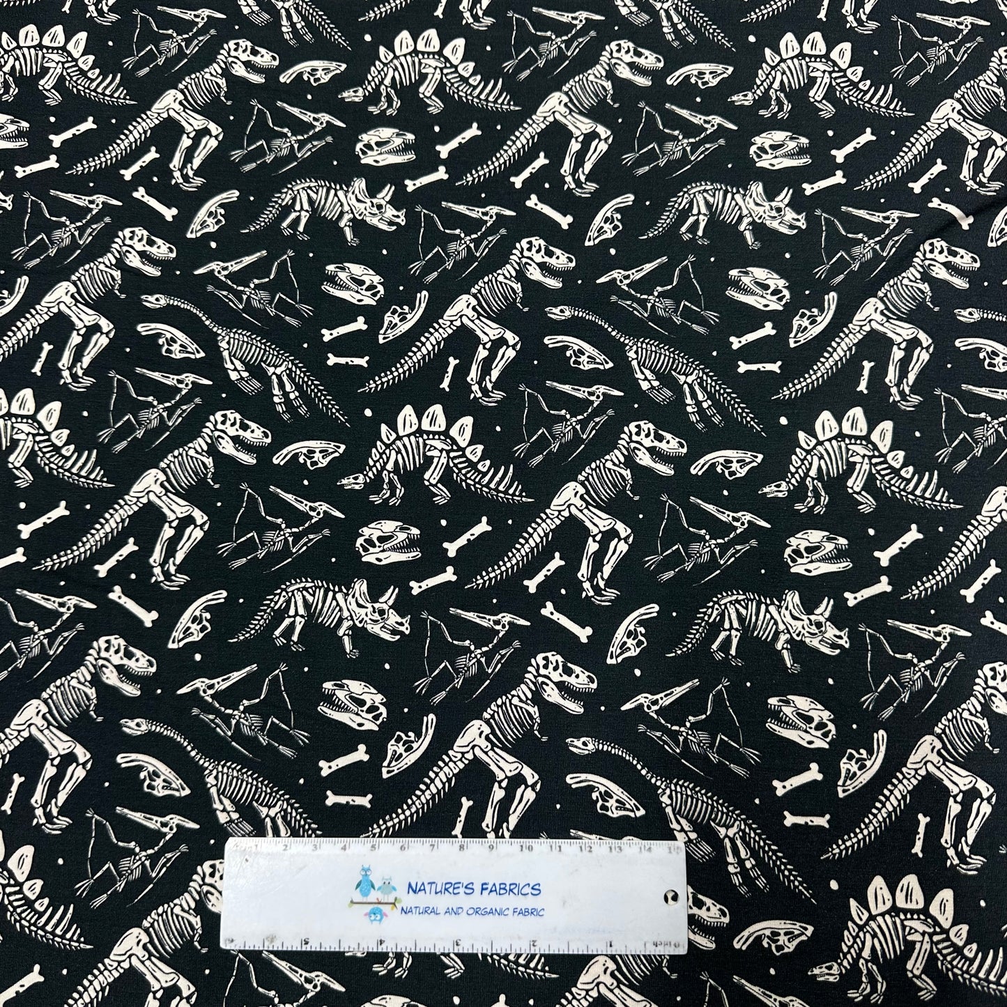 Dino Skeletons on Bamboo/Spandex Jersey Fabric - Nature's Fabrics