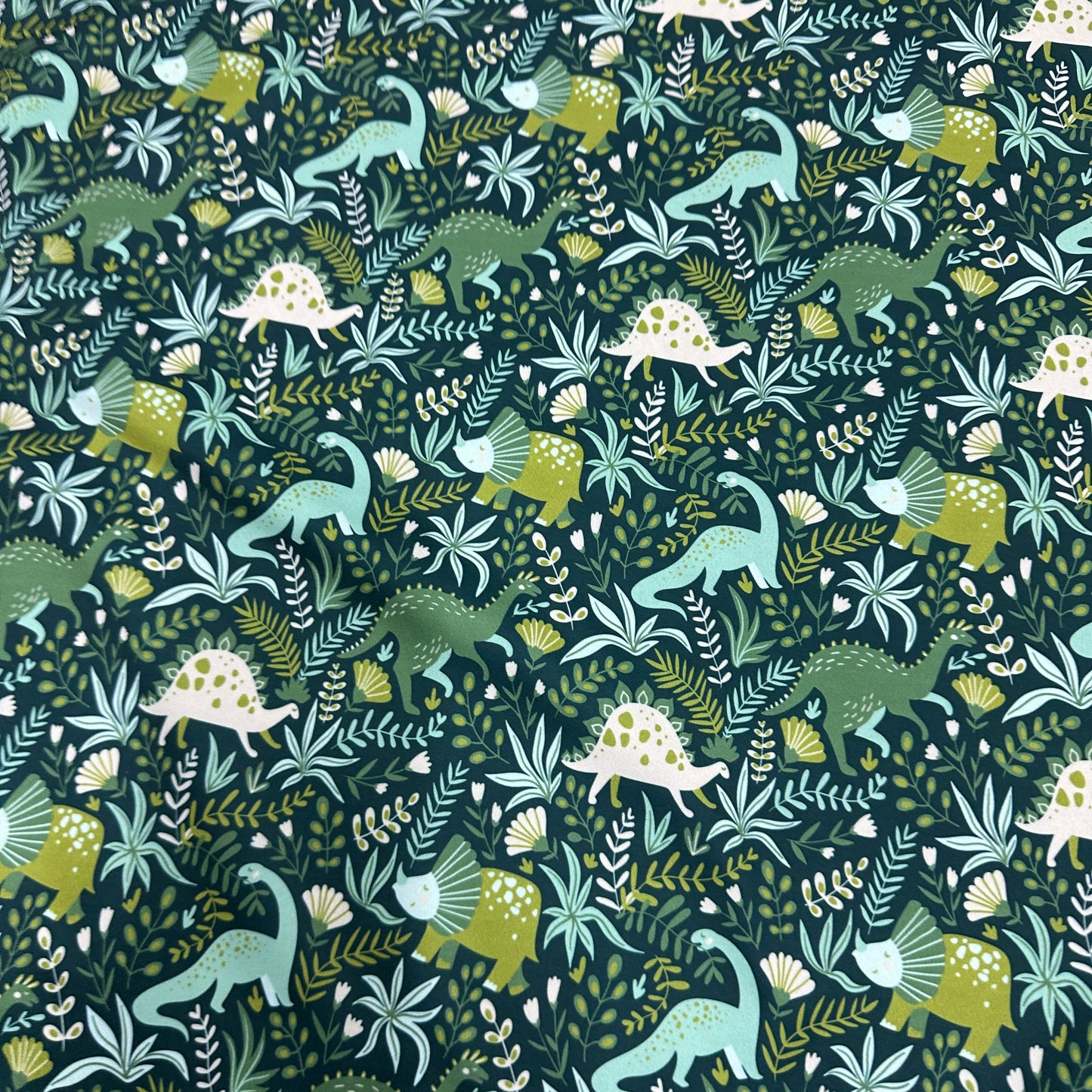 Dinosaurs on Green 1 mil PUL Fabric - Made in the USA - Nature's Fabrics